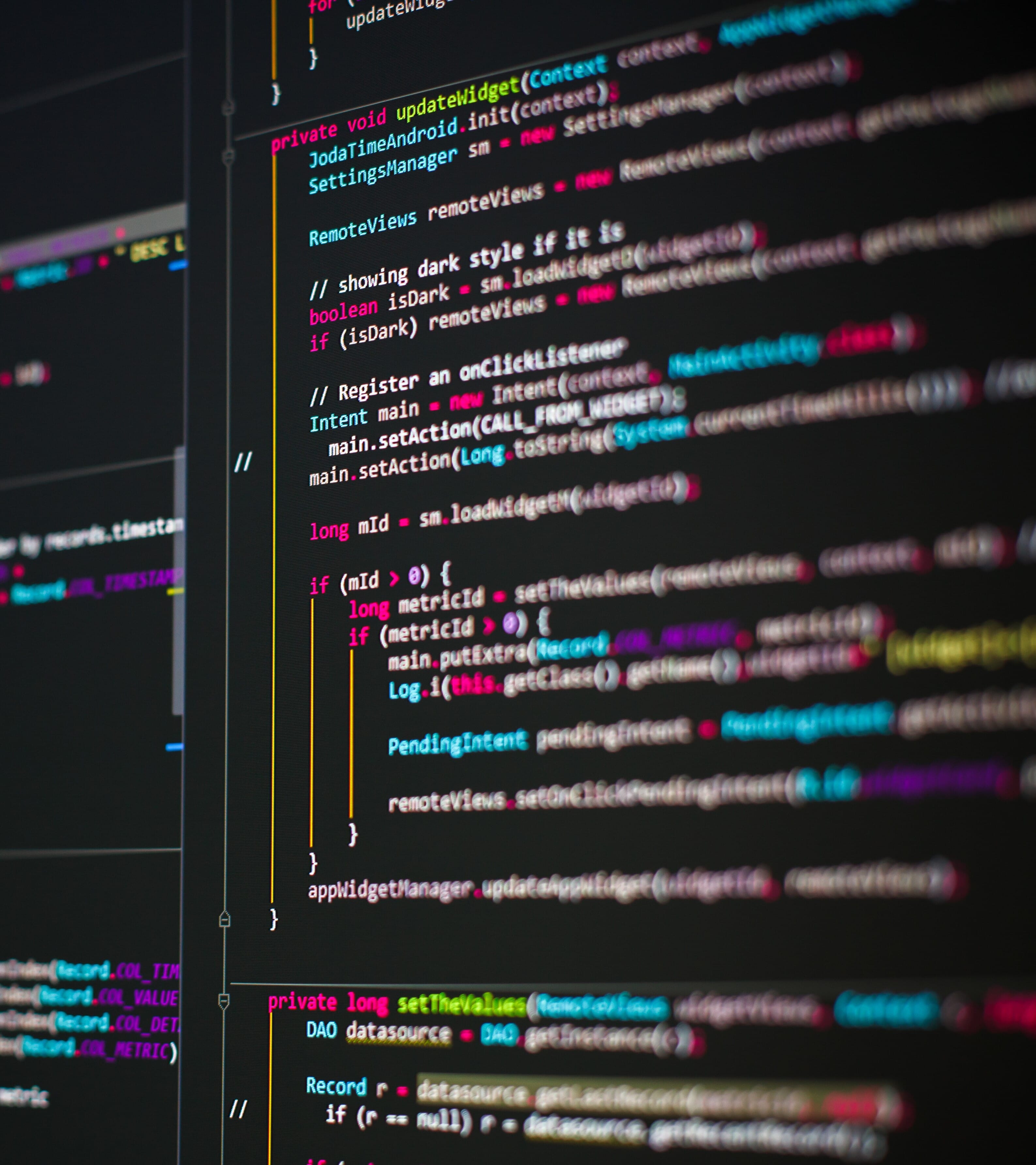 Software development. Lines of colorful code on the computer screen